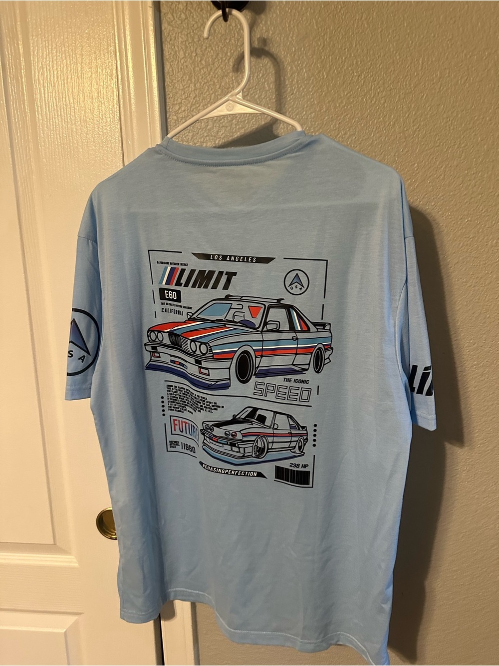 Source Unknown Light Blue Racing Graphic Tee with Multicolor Stripes